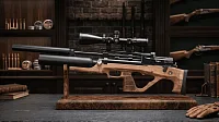 Jager SP Bullpup 6.35 мм в деревянной ложе на подставке в интерьере оружейной